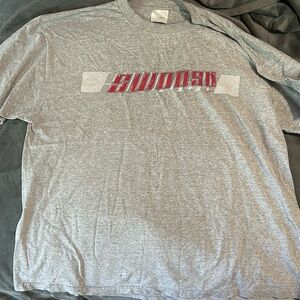 Grey vintage Nike tee size men’s large. Small stain on front see pic. No tears.